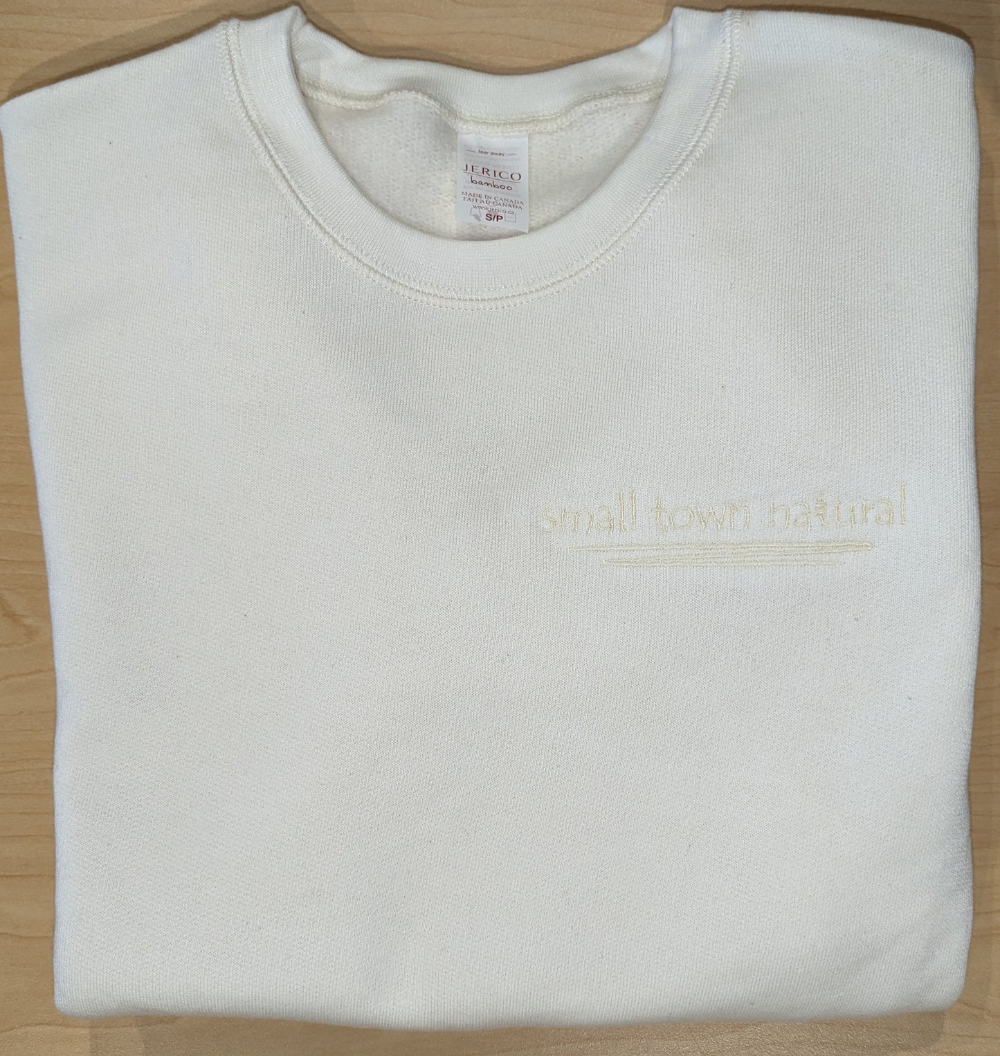 Small Town Natural 3-end bamboo fleece crew neck sweatshirt: (colour=natural vanilla with embroidery vanilla thread colour for a subtle and natural look) 70% rayon from bamboo 30% organic cotton.