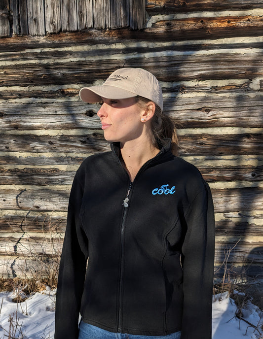 'Cool' embroidered upper left chest Hemp Track Jacket with removable pewter bike zipper pull - Women's sizing our model Morgan is wearing a black hemp track jacket with ice blue 'cool' +cyclist embroidered on upper left chest 55% Hemp 45% Organic Cotton – Fleece