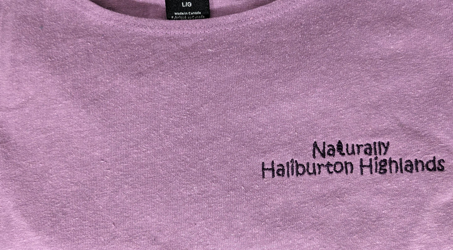 Naturally Haliburton Highlands Hemp 3/4 sleeve Fluid Top- Women, colour= lilac with black thread embroidery spelling 'Naturally Haliburton Highlands"